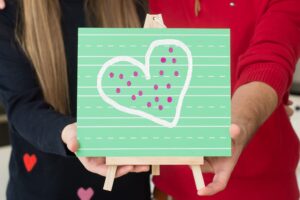 Five Teaching Ideas for Valentine's Day showing heart and hands