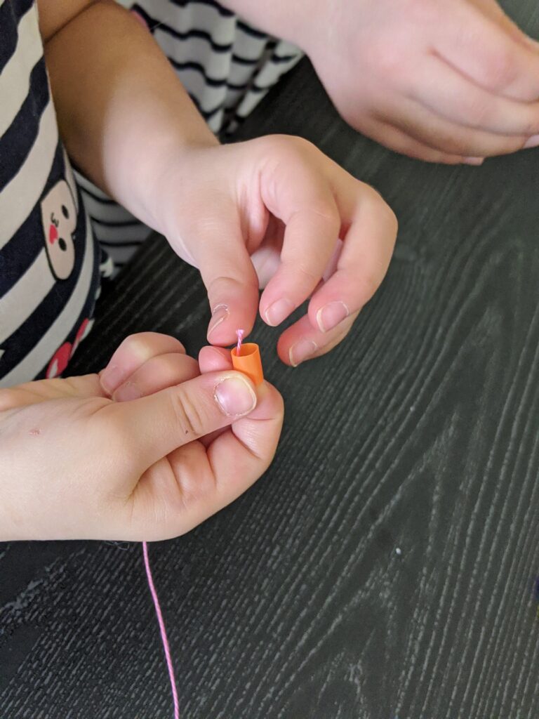 To celebrate the 100th day of school, students can make necklaces by counting out ten of each color bead (of your choice) and string them together. 